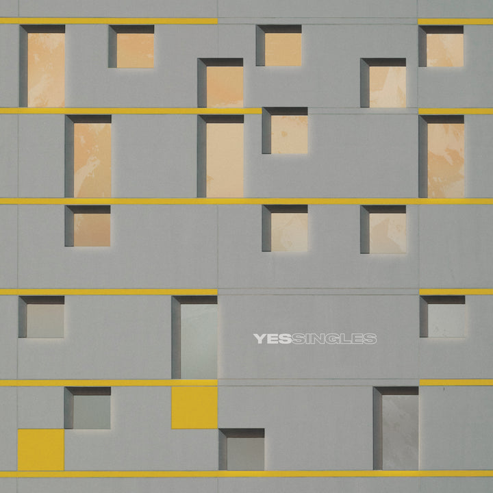 Yes - Yessingles (ROCKTOBER) (Yellow/Orange/Black Splatter Vinyl) Vinyl - PORTLAND DISTRO